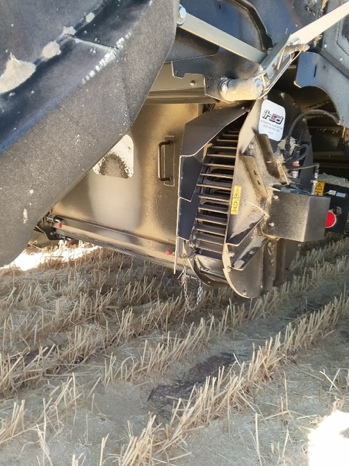 Integrated impact mill on back of combine.